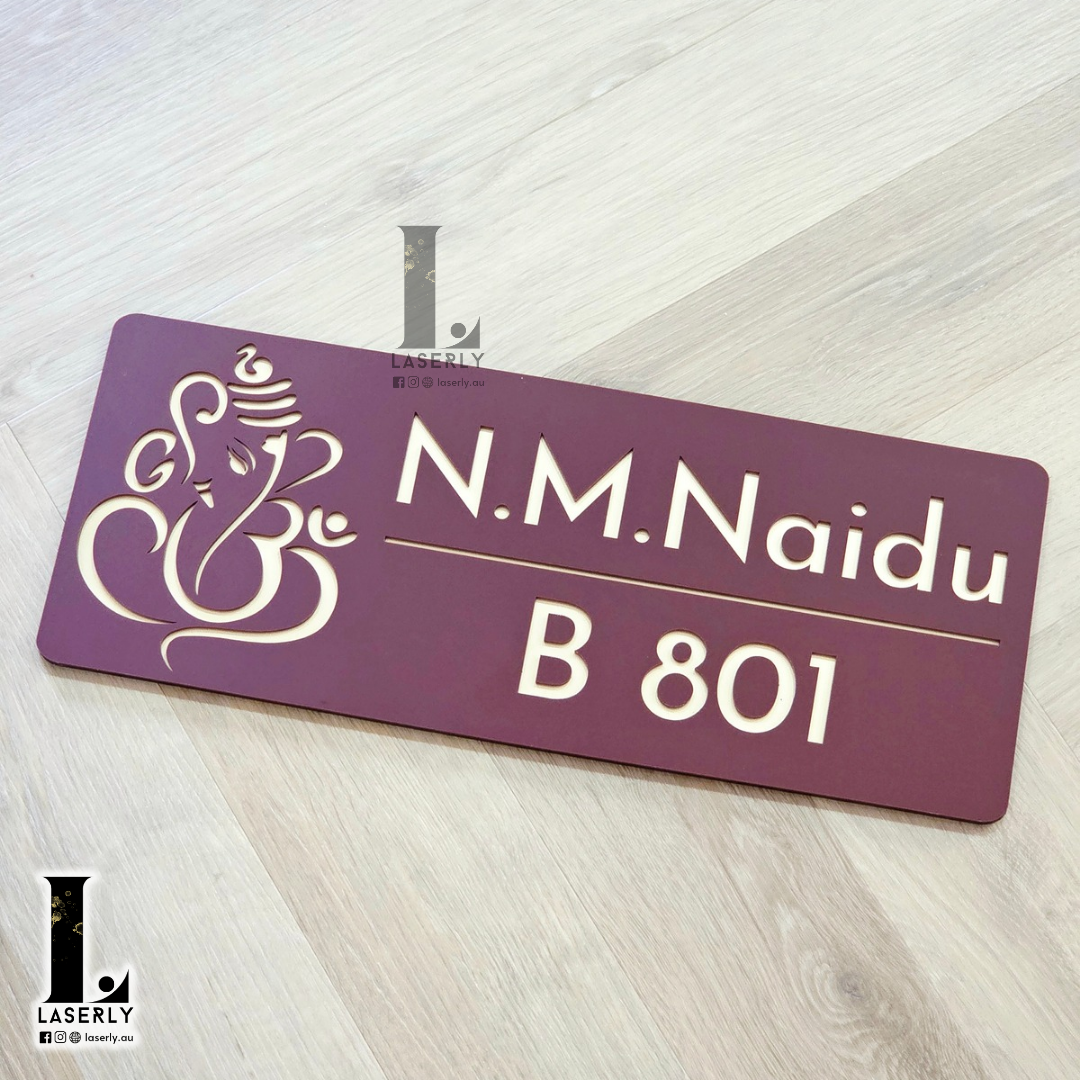 Decorative Ganesha house number plaque in brown and mirror gold acrylic finish.