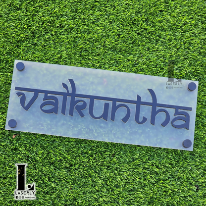 Contemporary acrylic house name sign with clear lettering for outdoor use.
