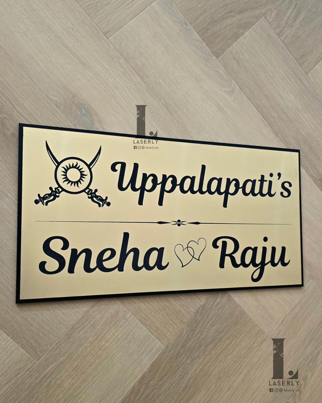Elegant Kshatriya-themed house number plaque on home wall with sleek finish.