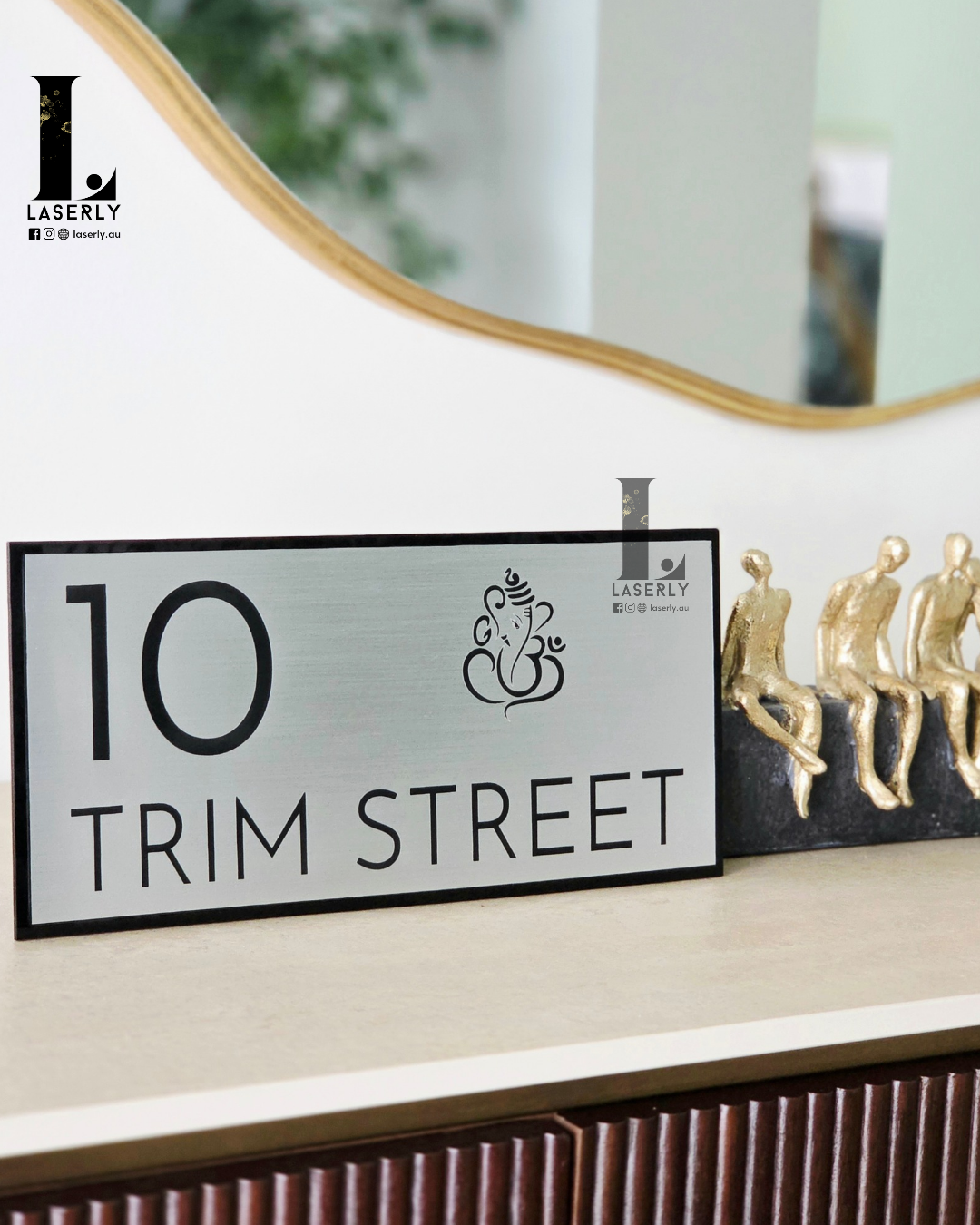 Contemporary minimal house number display with spiritual Ganesha motif.