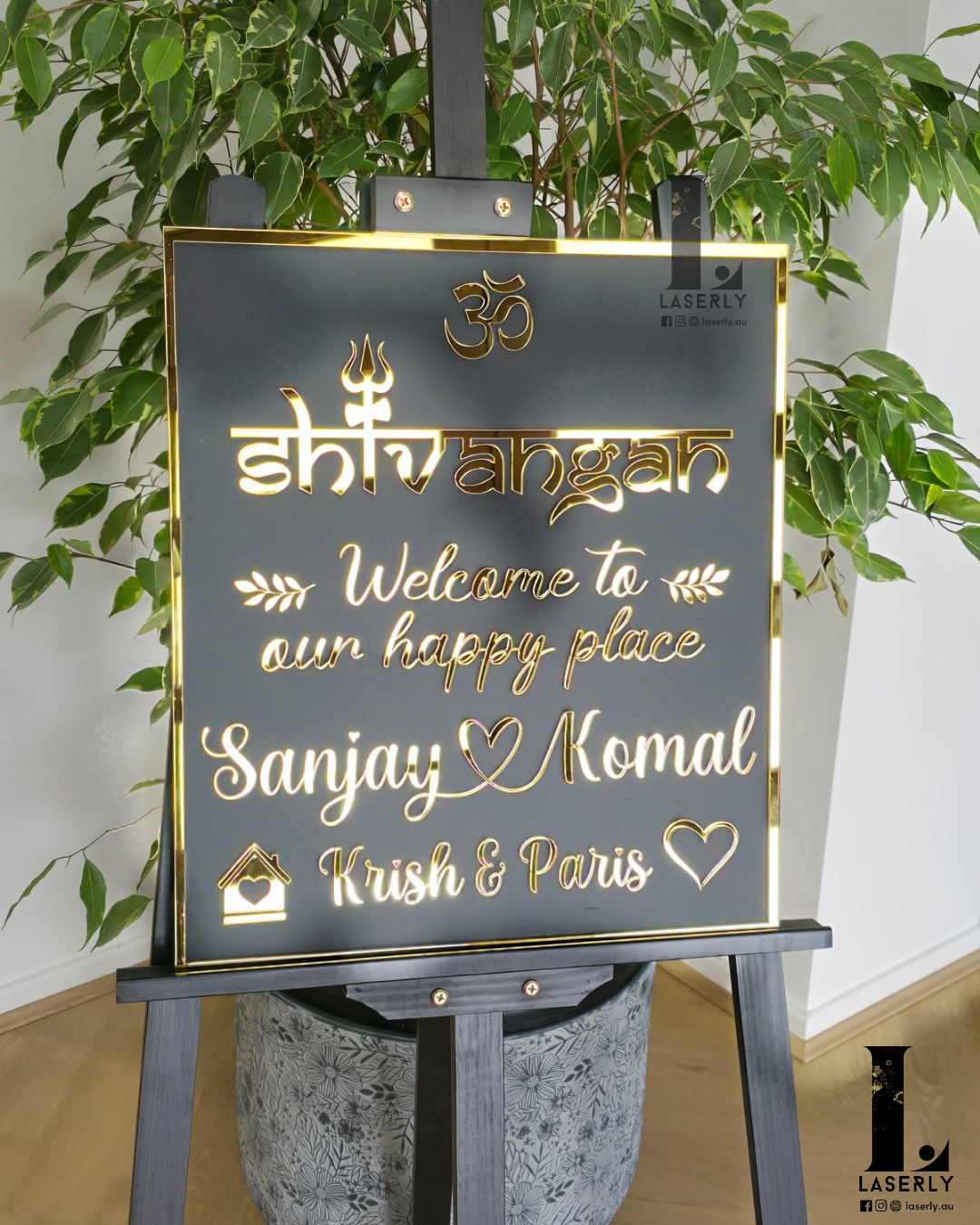 Elegant acrylic Om Shiva wall plaque displaying house number at front door.