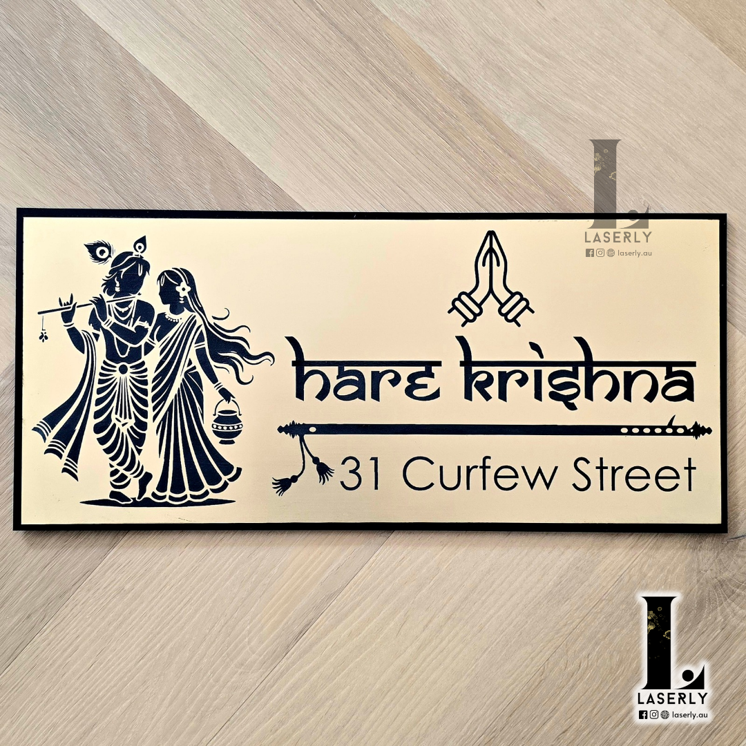 Radhe Krishna house number sign featuring elegant laser-cut design mounted beside the main entrance door.