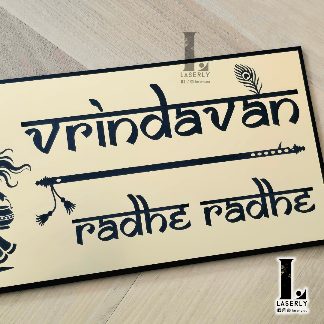 Modern Radhe Krishna Vrindhavan house number sign crafted in acrylic with devotional design and clear numbering.