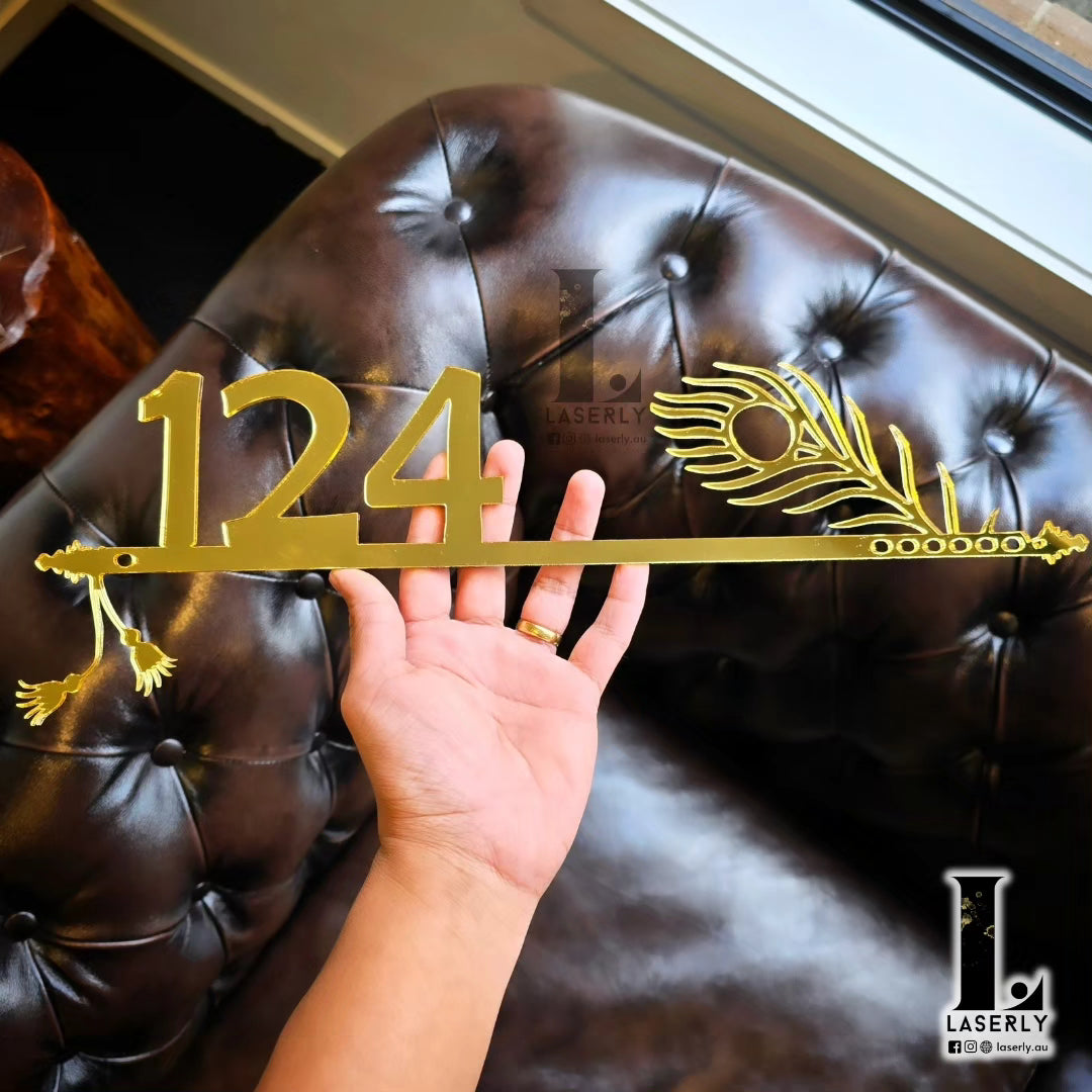 Custom house number sign inspired by Lord Krishna’s flute, perfect for home entrances.