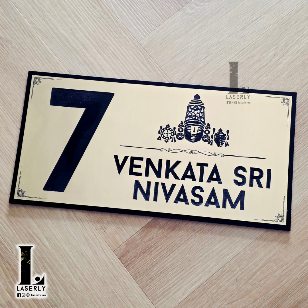 Stylish Thirumala house number plate enhancing the entrance of a home.